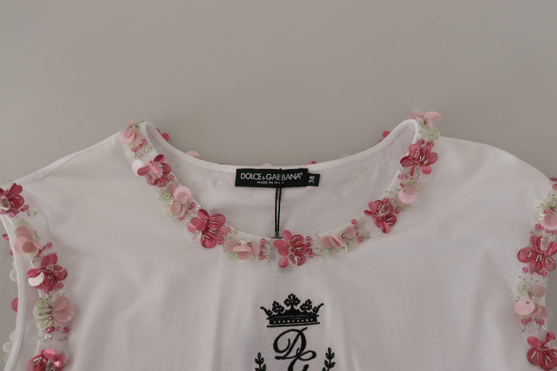 White shirt with pink flowers on neckline