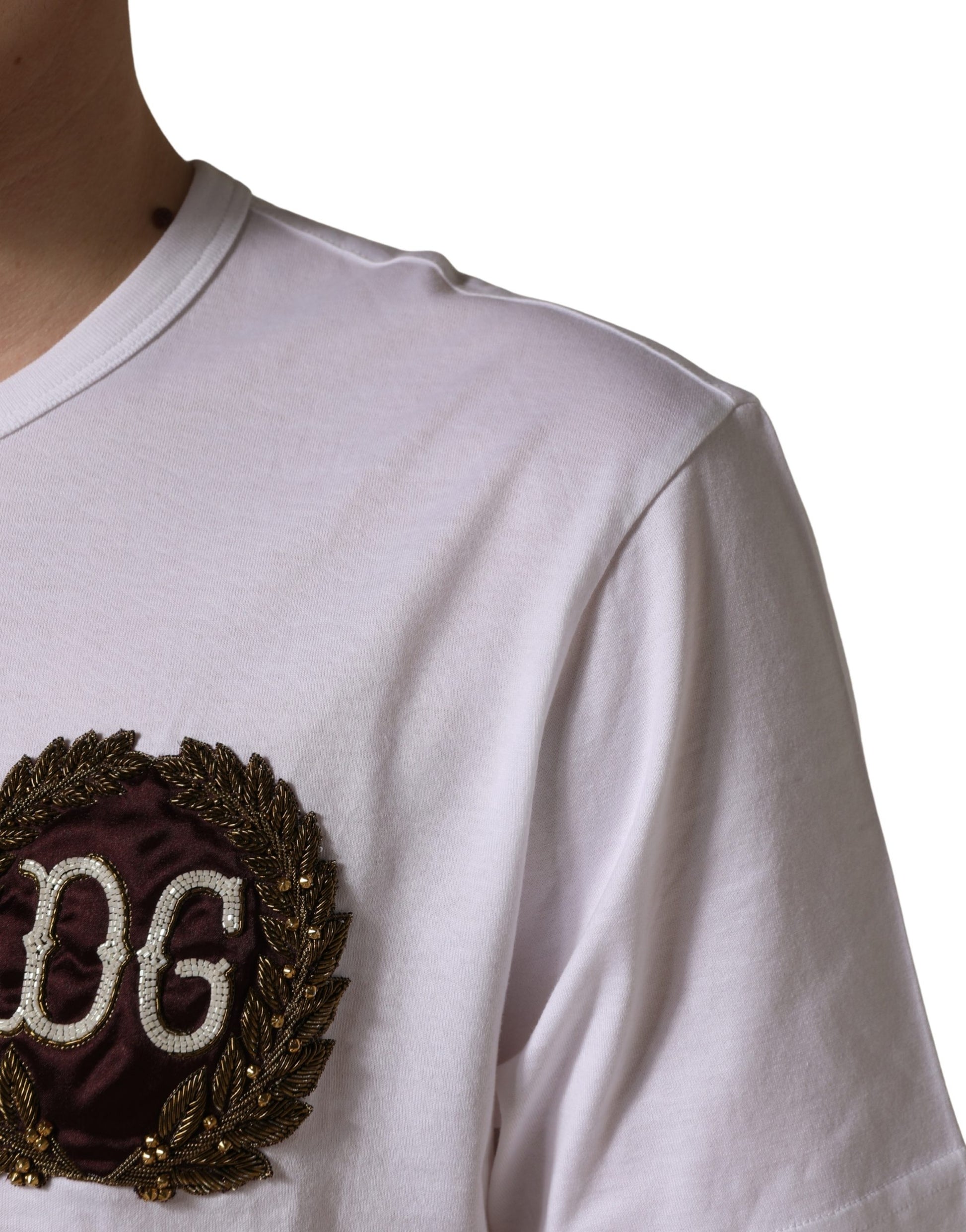 White short sleeve shirt with embroidered logo on left chest