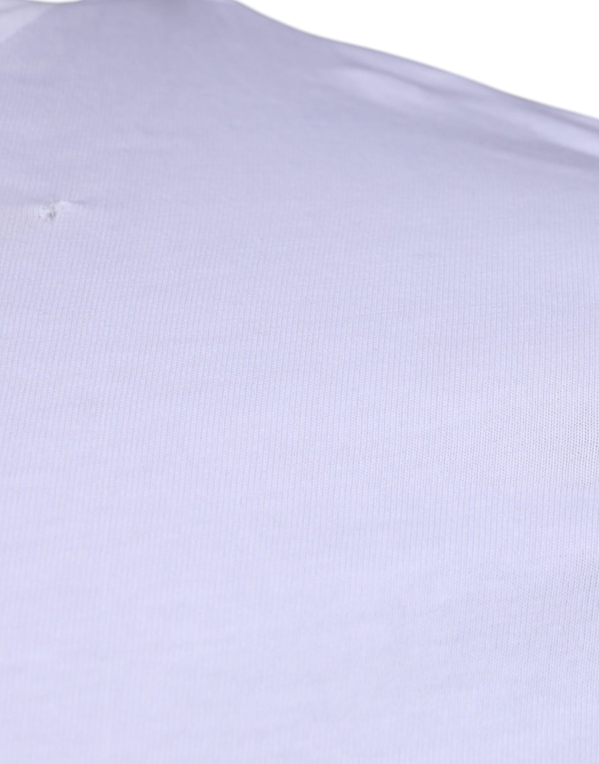 Purple fabric with small hole in corner