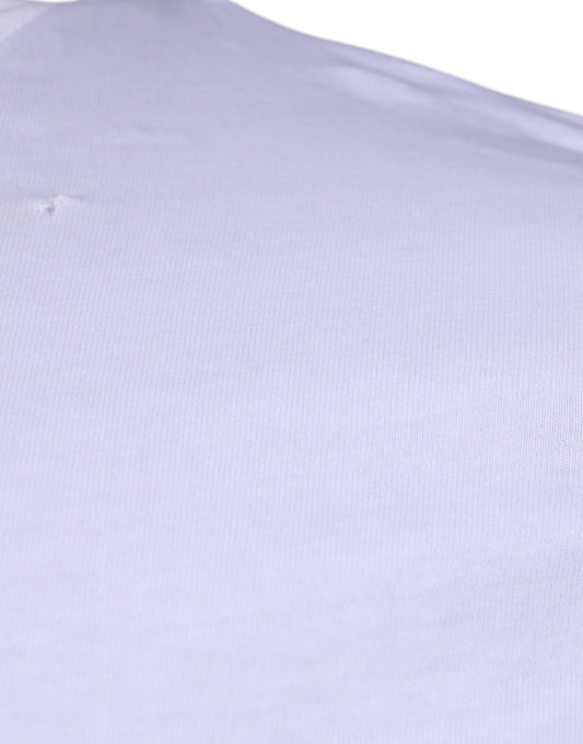 Purple fabric with small hole in corner