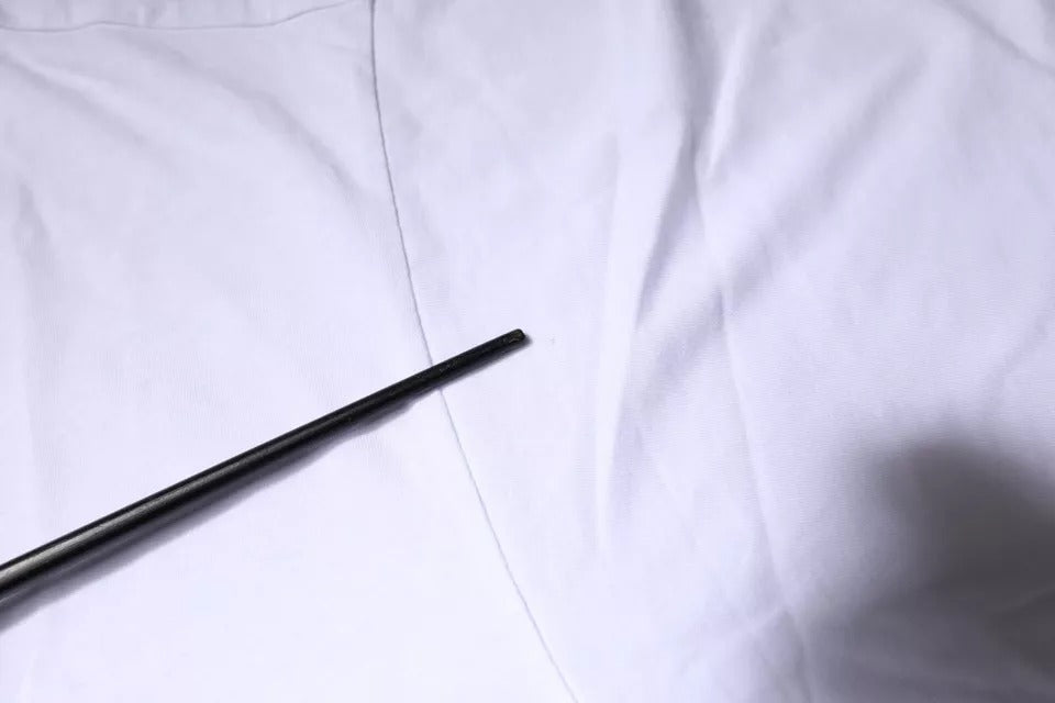 Black pen on white surface