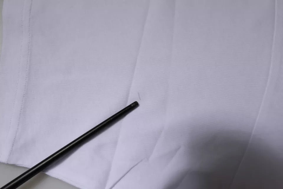 Black chopsticks on white napkin