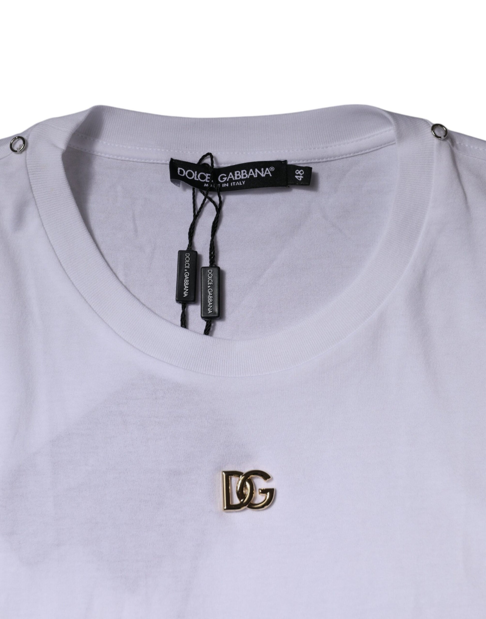 White t-shirt with a gold logo on the left chest area