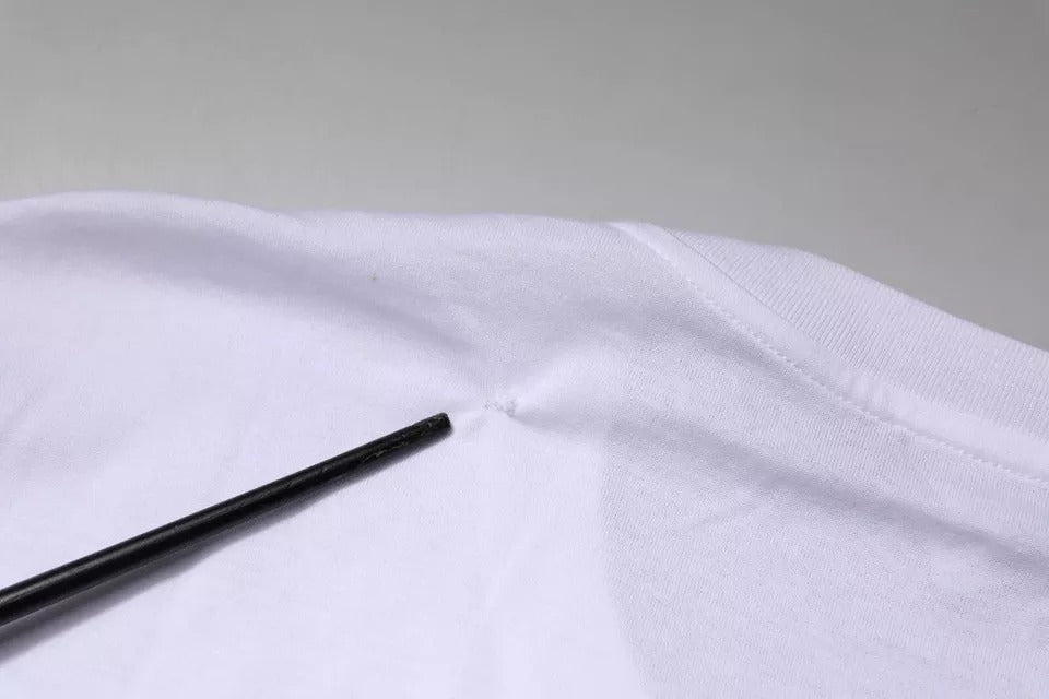 Black chopsticks on white cloth