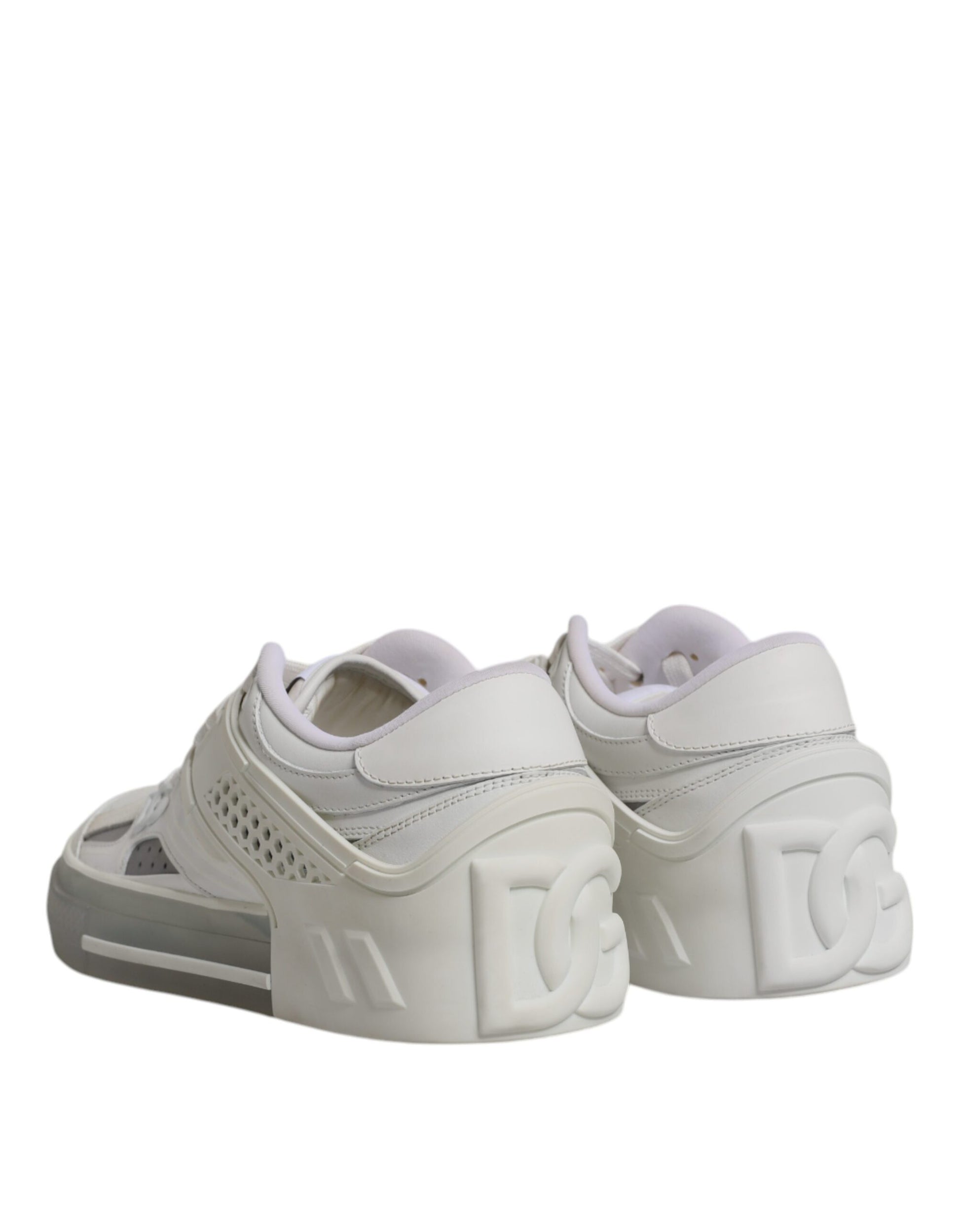 Pair of white sneakers with pink laces and soles