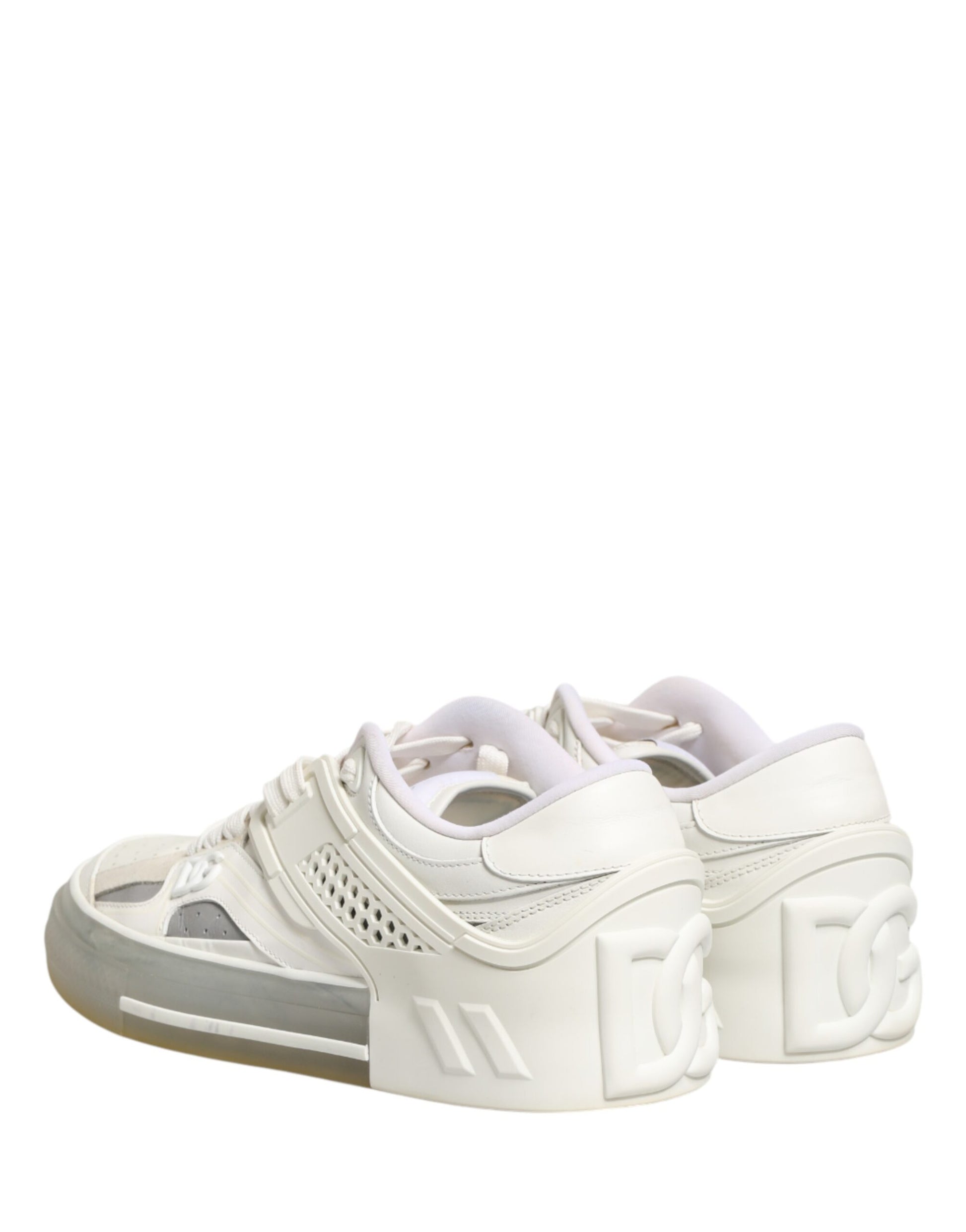 Pair of white sneakers with pink laces