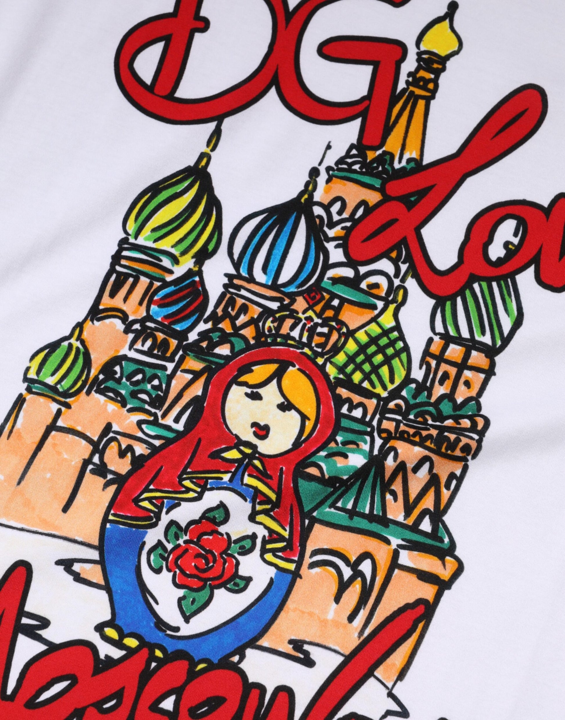 A graphic design on a piece of clothing featuring an illustration of the Kremlin in Moscow, Russia, with a wo