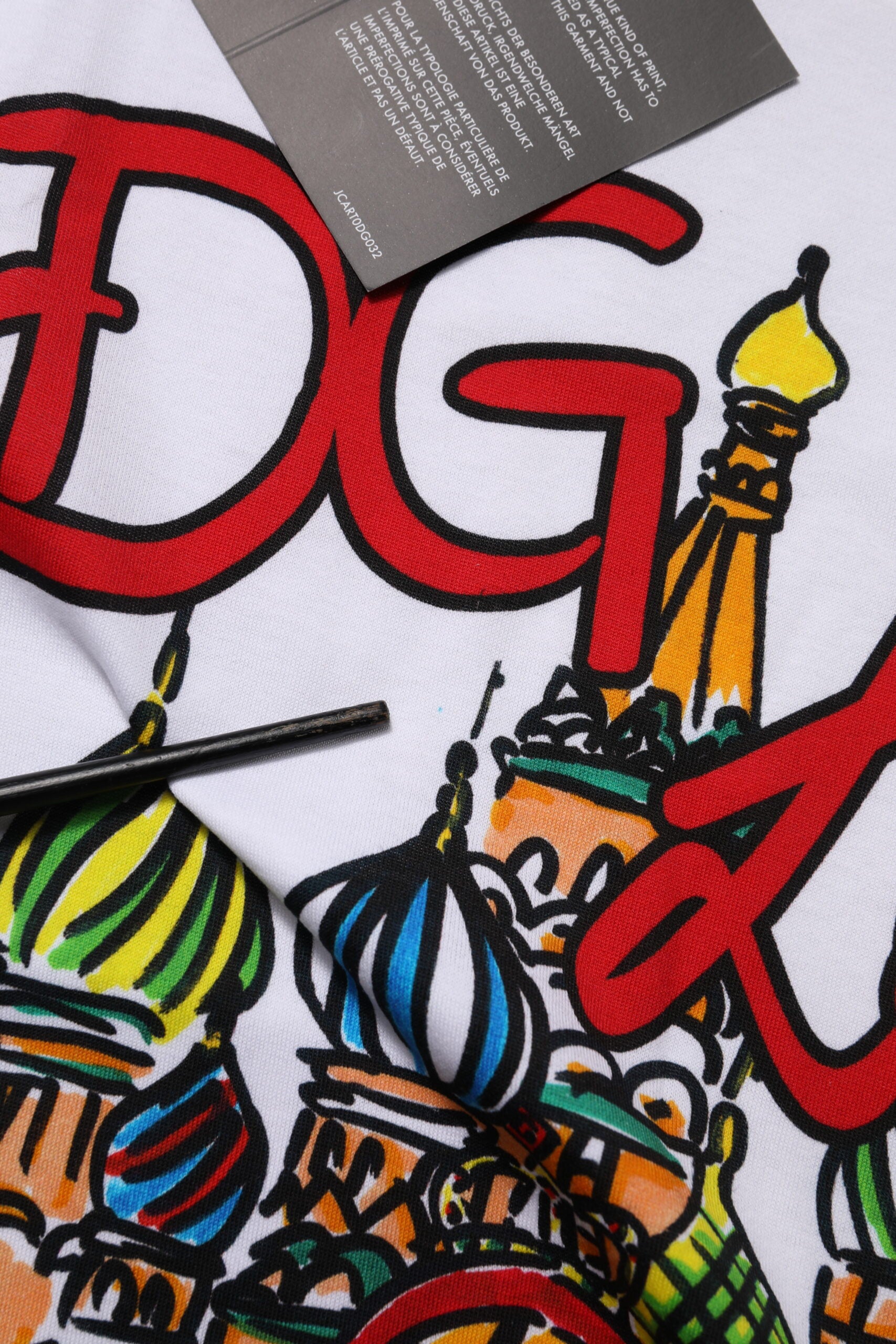 Colorful towel with embroidered letters and illustration of St Basil's Cathedral