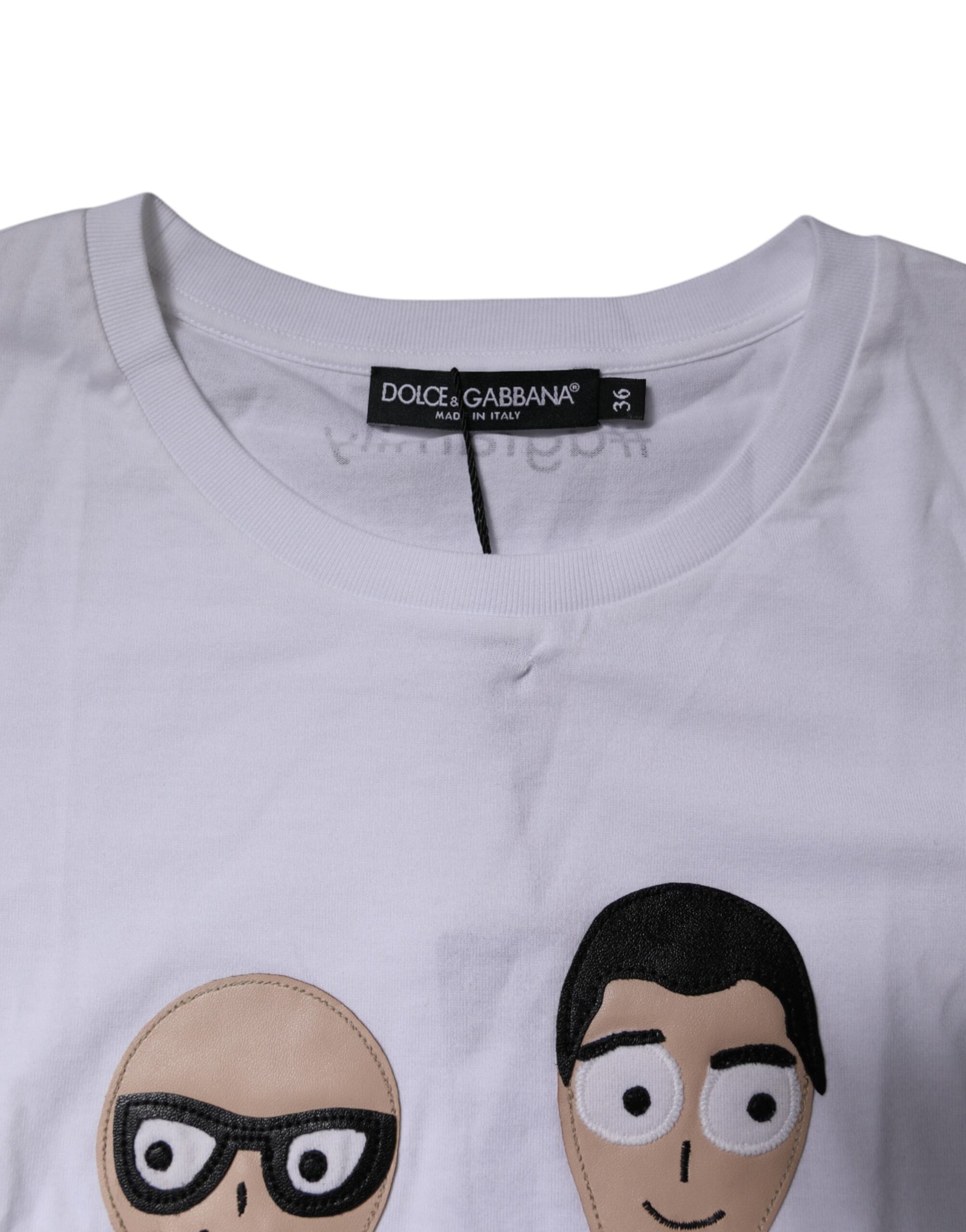 White t-shirt with cartoon faces on front