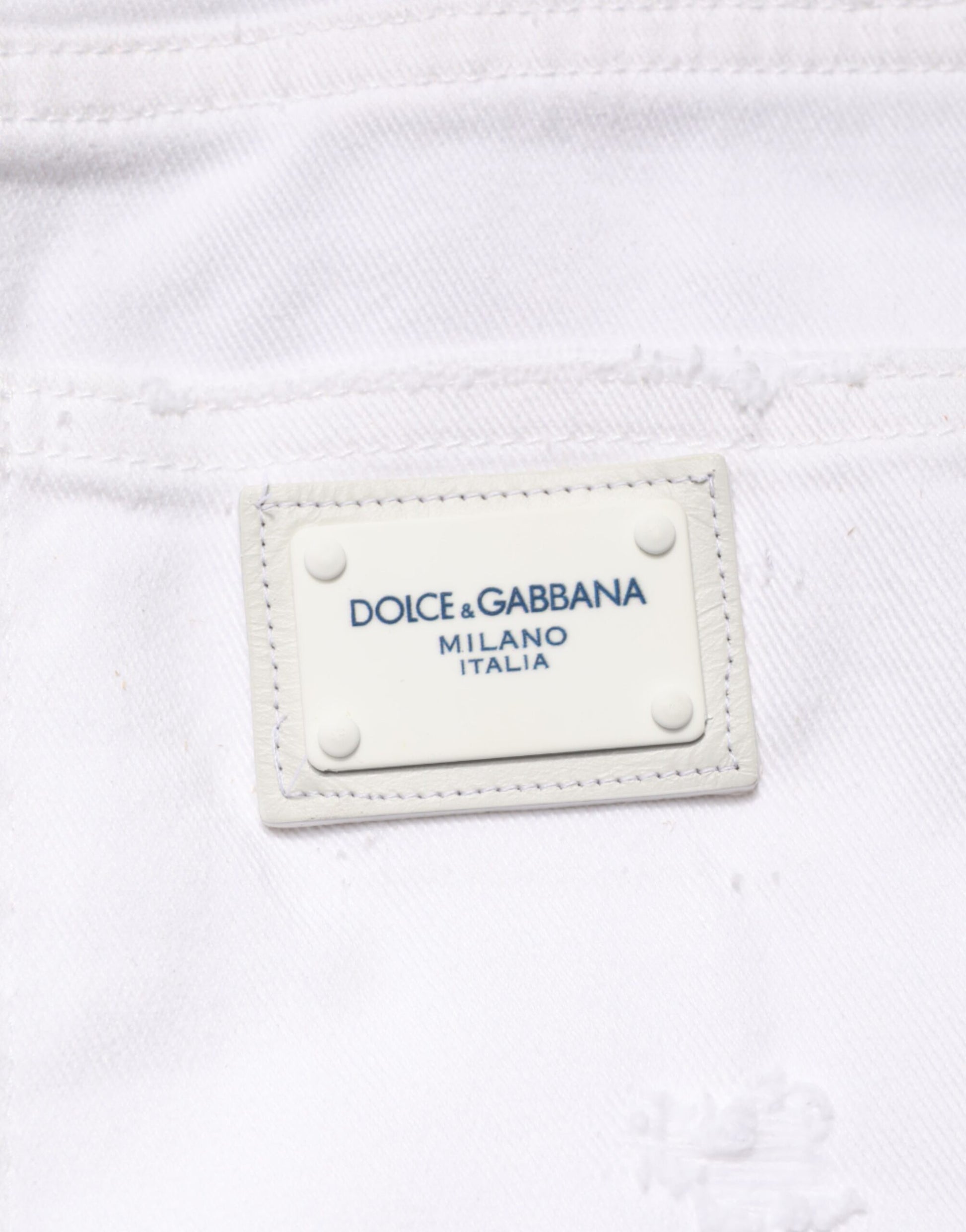 White tag on clothing