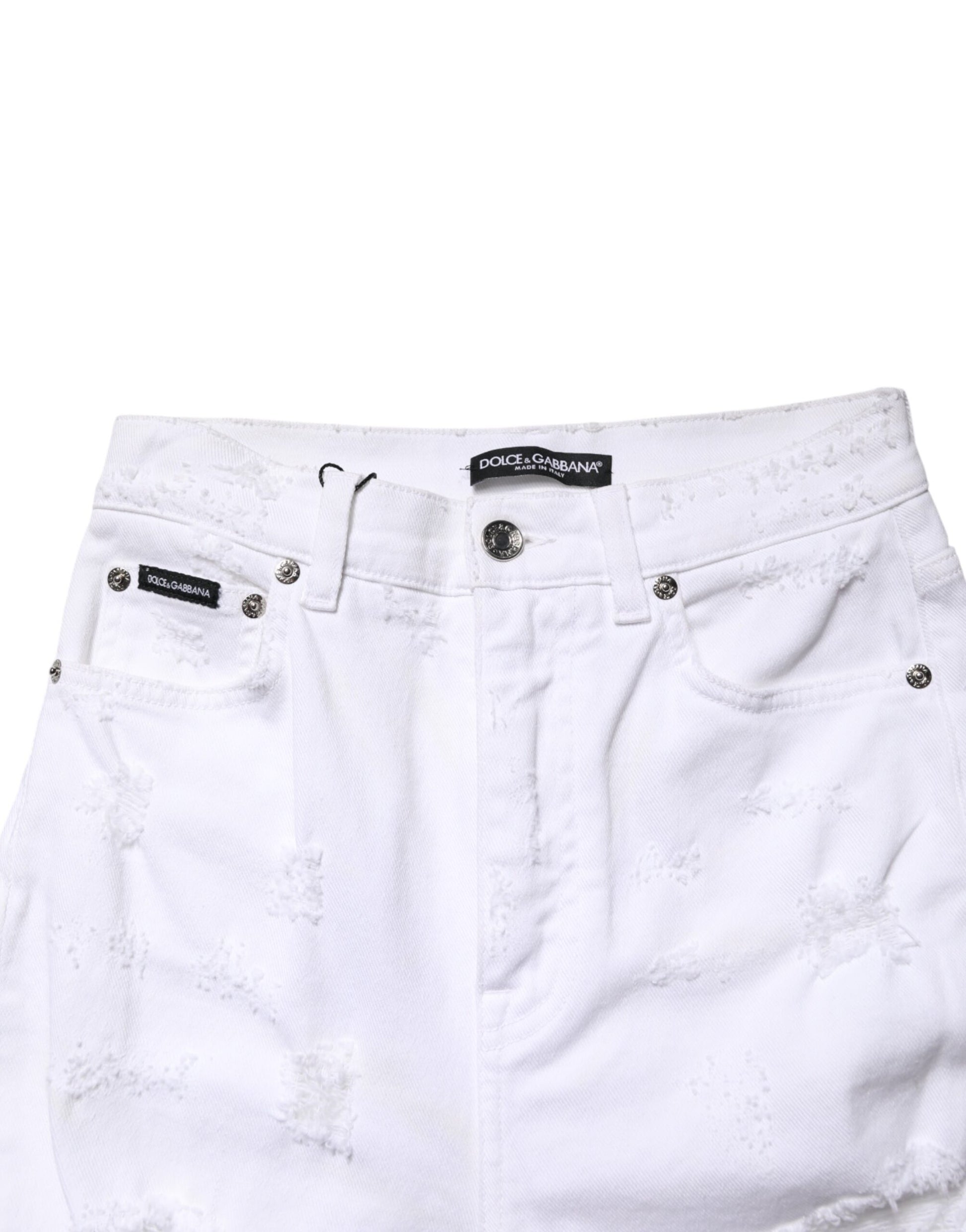 White denim shorts with distressed detailing