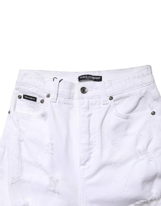 White denim shorts with distressed detailing