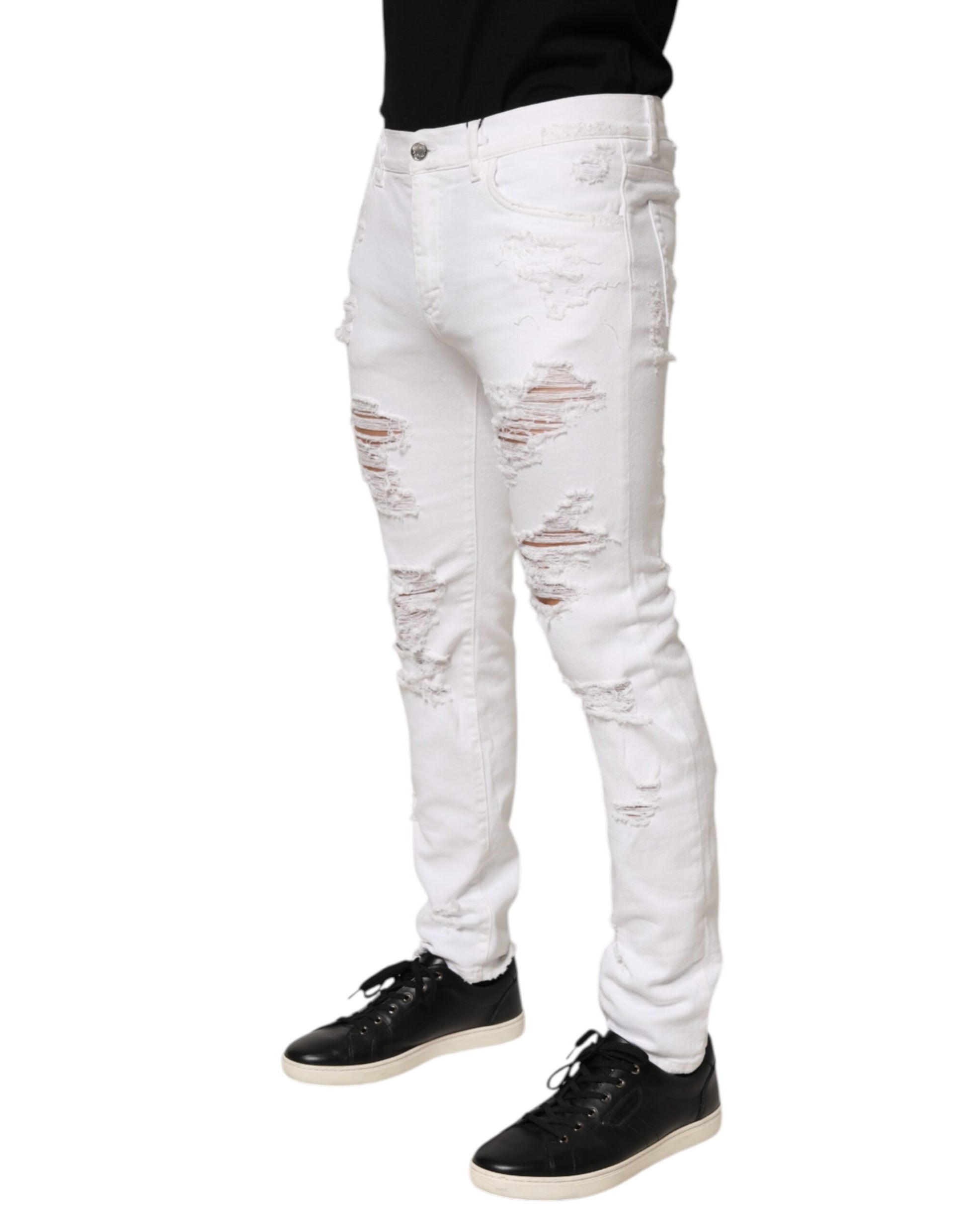 White ripped jeans on a person