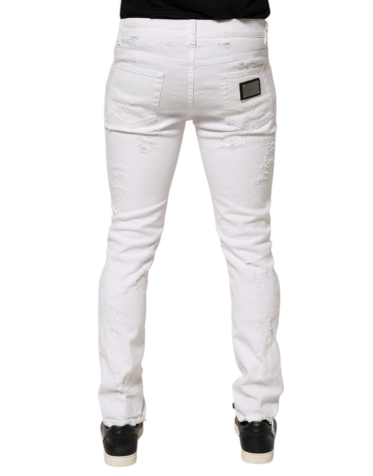 White denim jeans with distressed design on legs