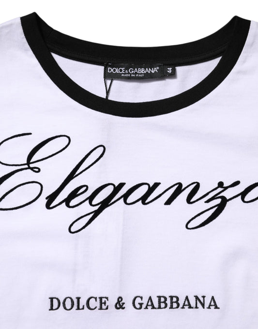 White t-shirt with black collar and sleeves featuring brand names in cursive script
