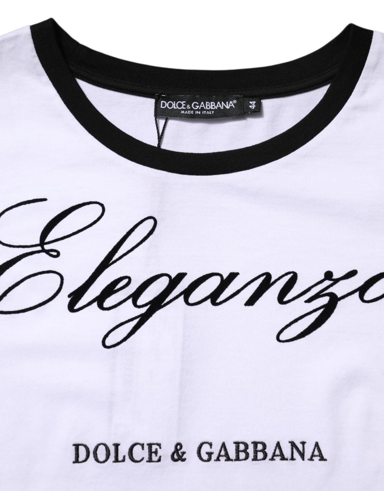 White shirt with black collar and sleeves featuring brand names in cursive script