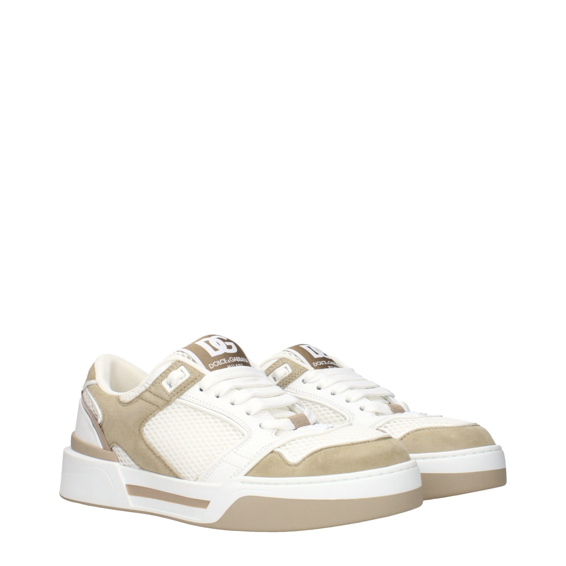 Tan and white low top sneakers with laces, brand logo on side