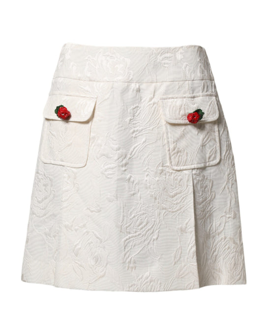 White skirt with lace pattern and red buttons