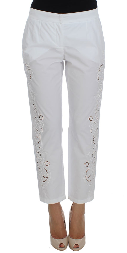 White pants with embroidered design on legs
