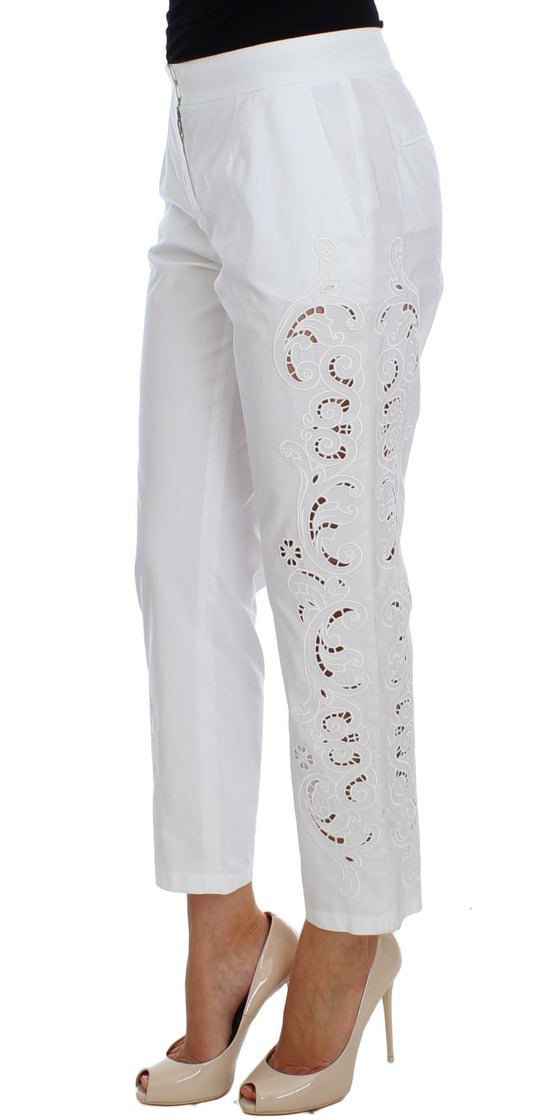 White pants with lace detailing on legs