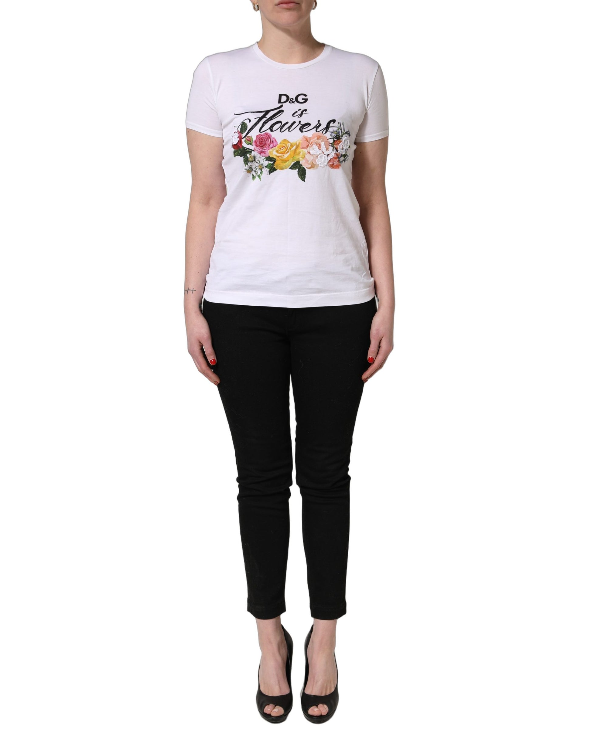 A white t-shirt with a floral graphic on the front