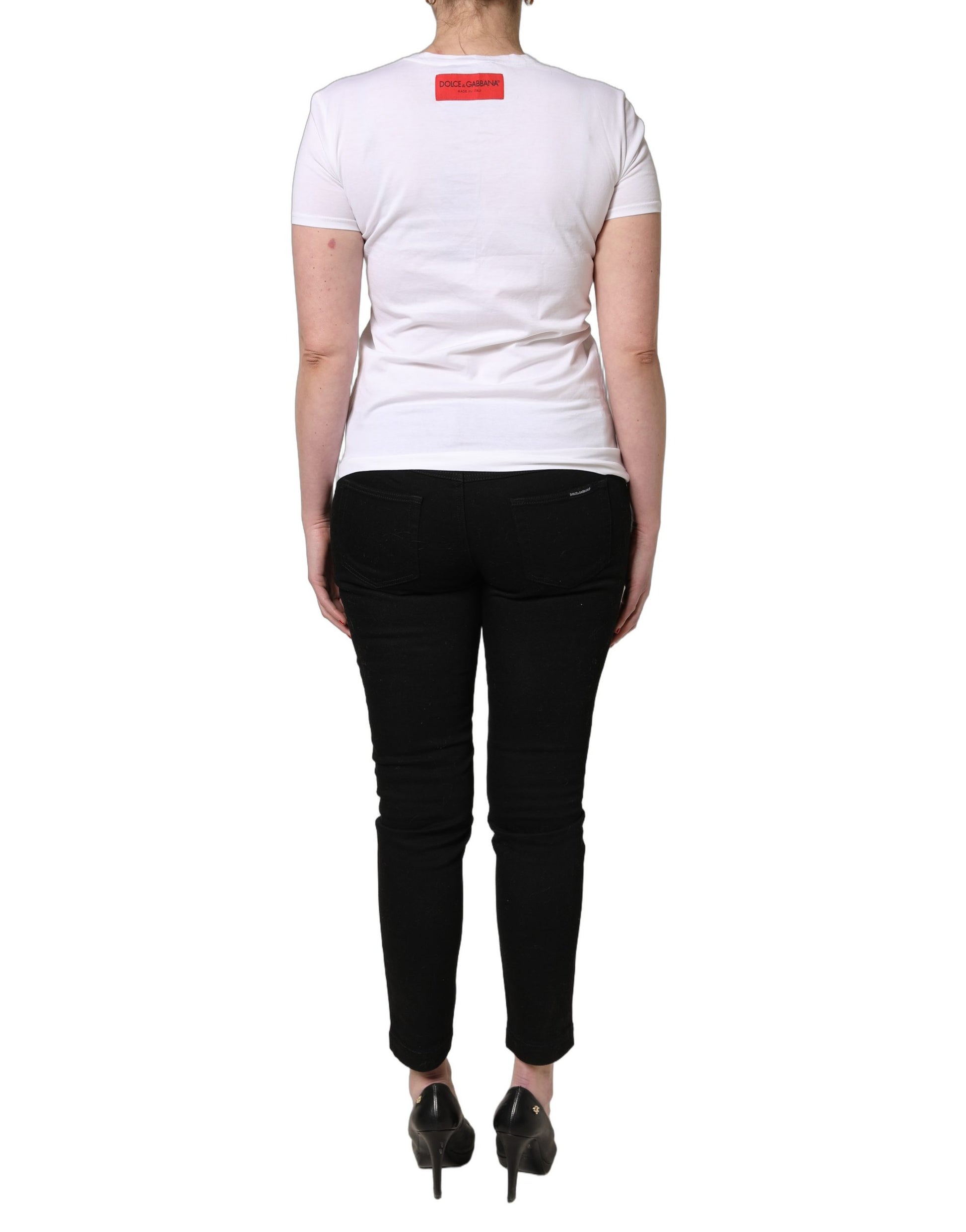 A white t-shirt with floral graphic on the front