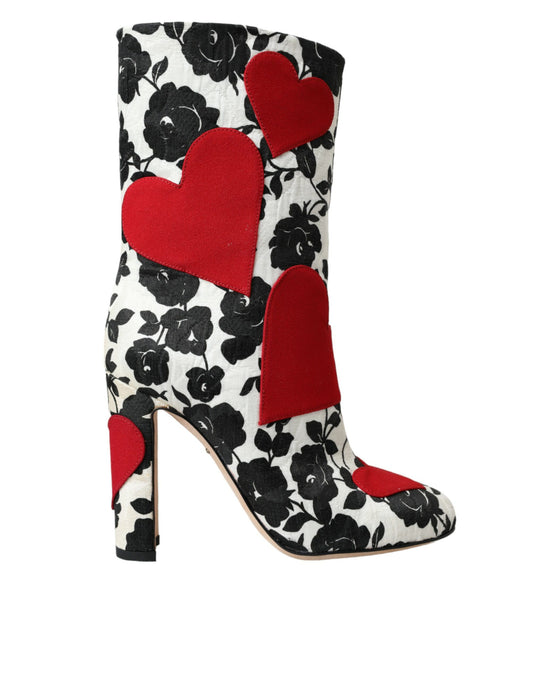Pair of women's boots with floral pattern and red hearts