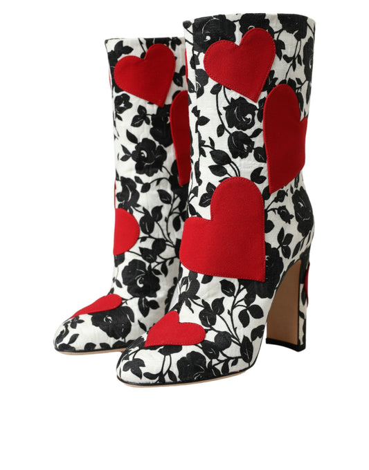 Pair of women's boots with red and black floral pattern featuring hearts