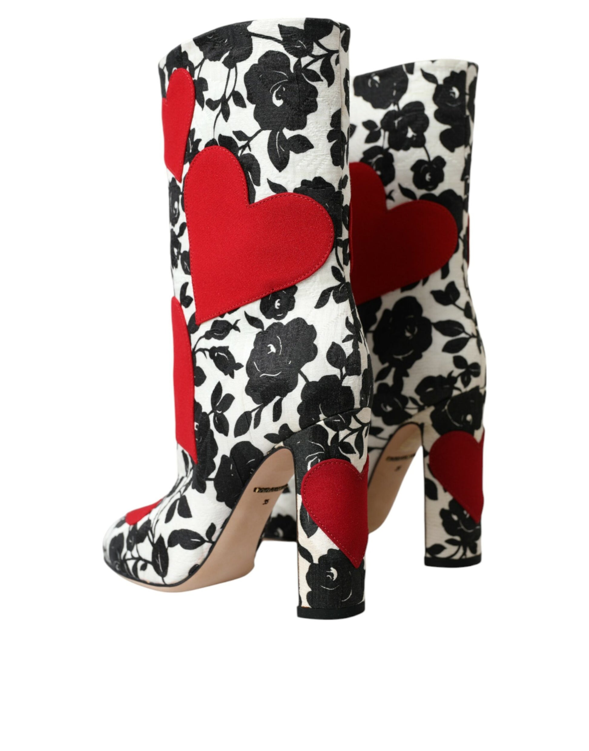 Pair of women's boots with floral pattern and red hearts