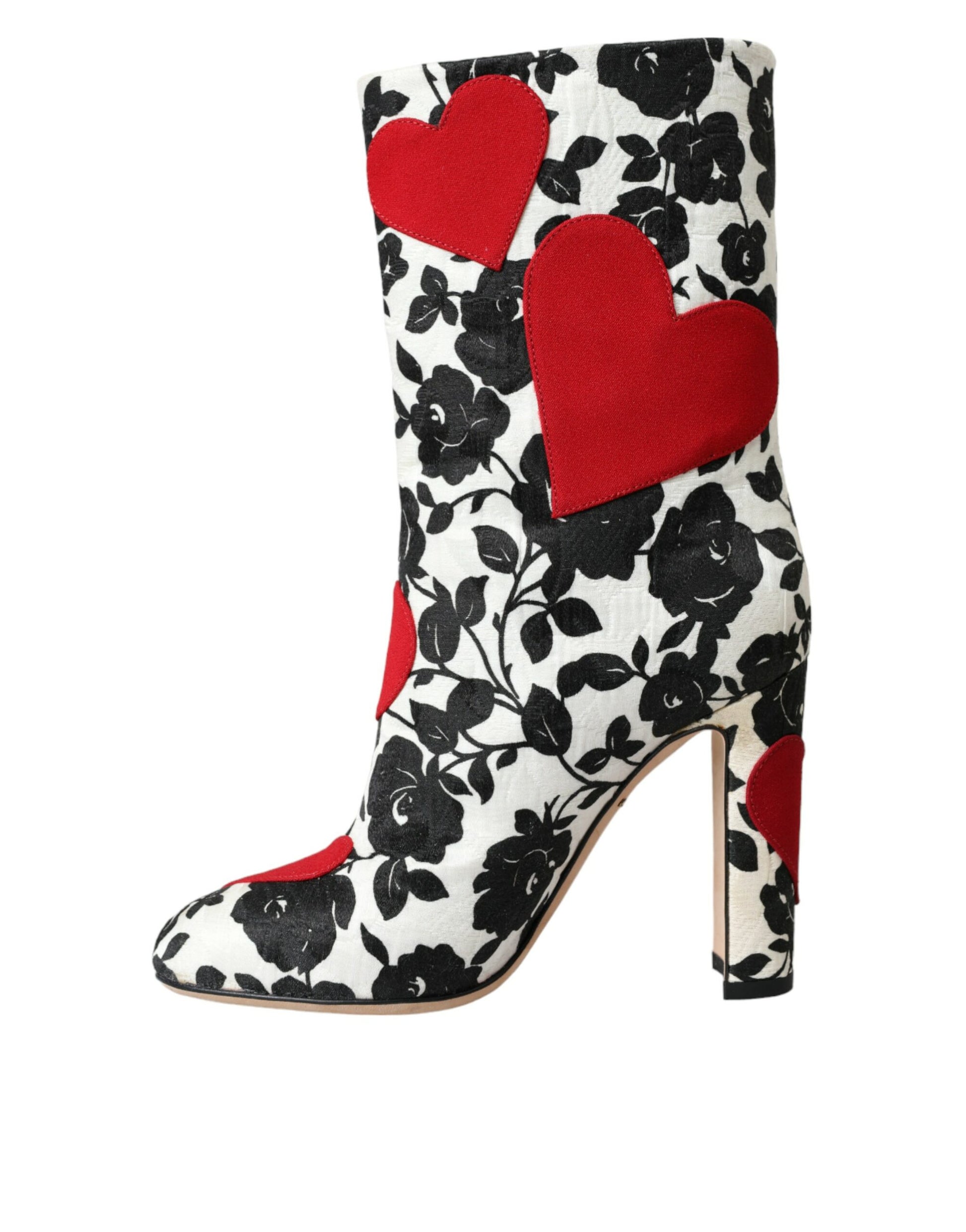 Black and white boot with red hearts on side