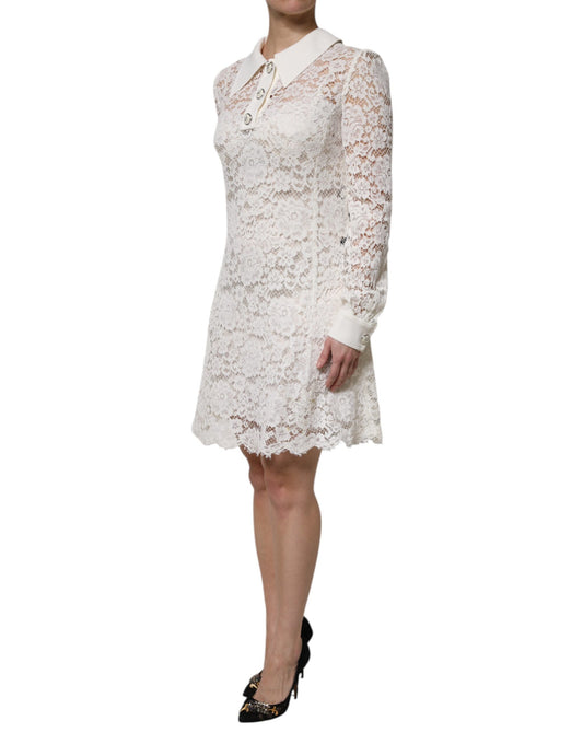 White lace dress with long sleeves and floral pattern