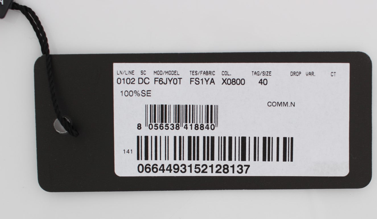 Black tag with white barcode and serial number