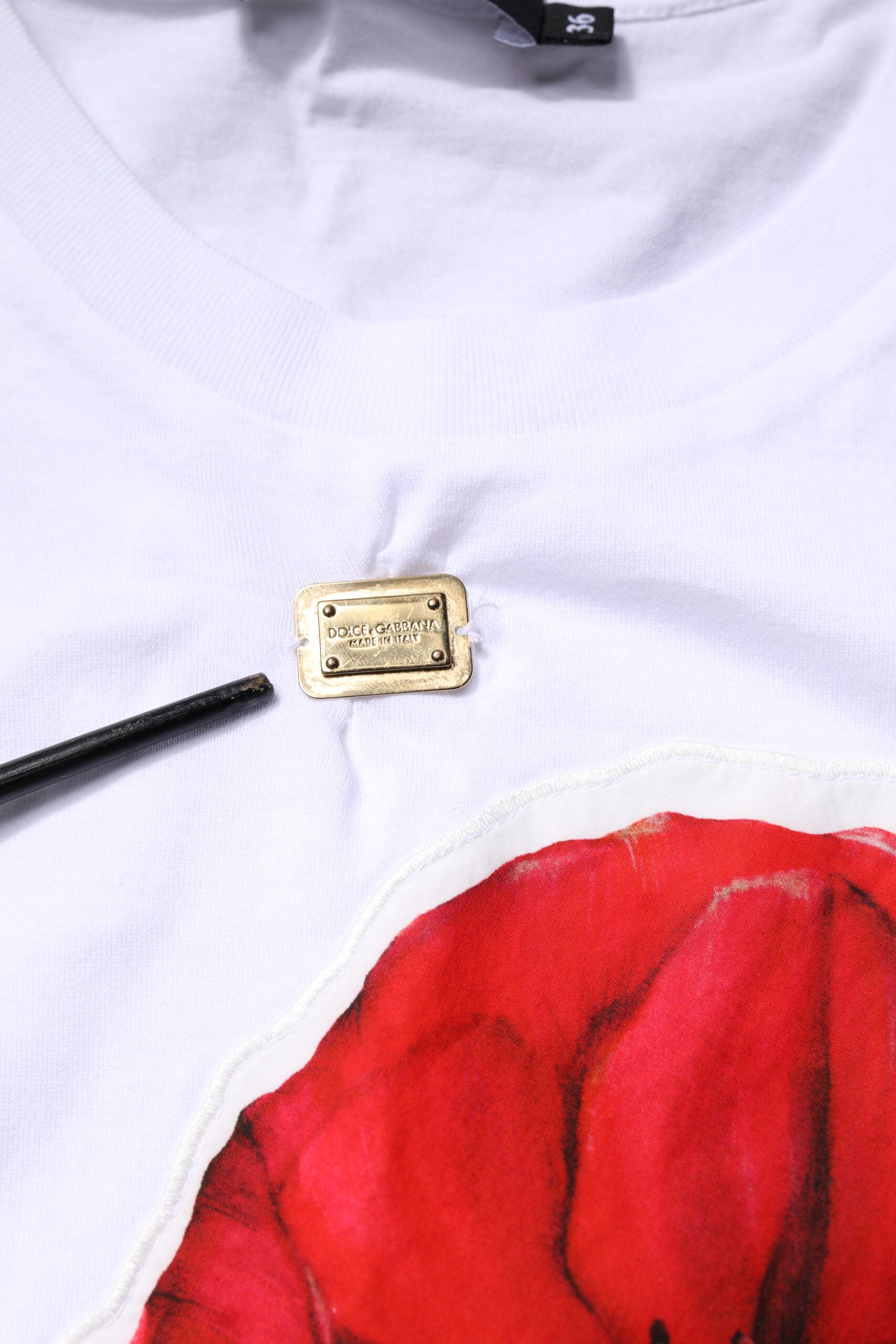 White t-shirt with red rose embroidery on front