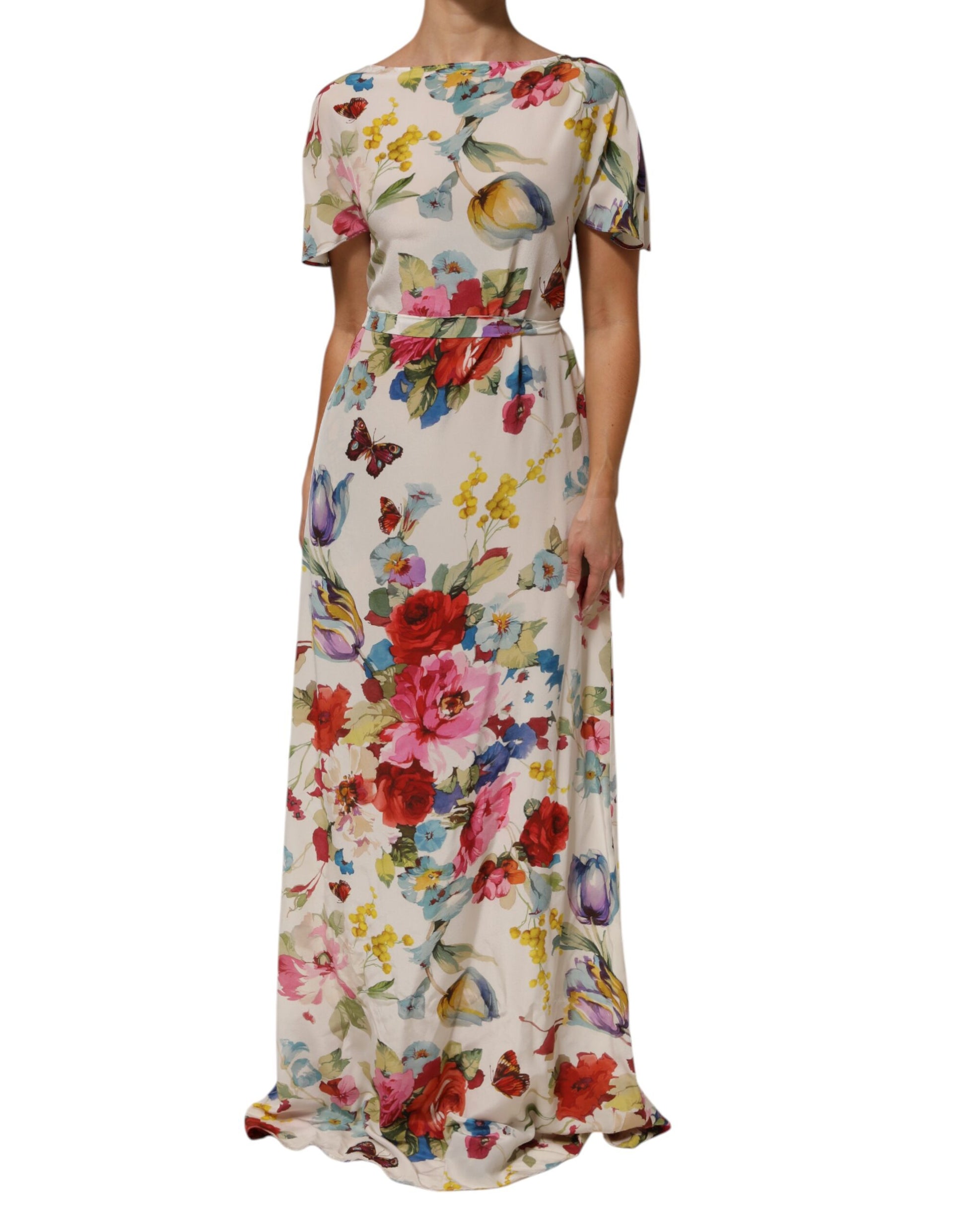 A long, white floral print silk sheath dress with a V-neckline and short sleeves