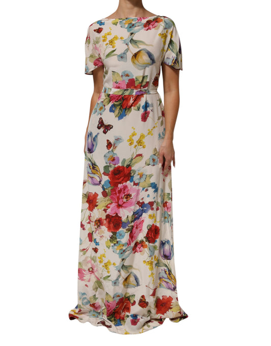 A long, white floral print silk sheath dress with a V-neckline and short sleeves