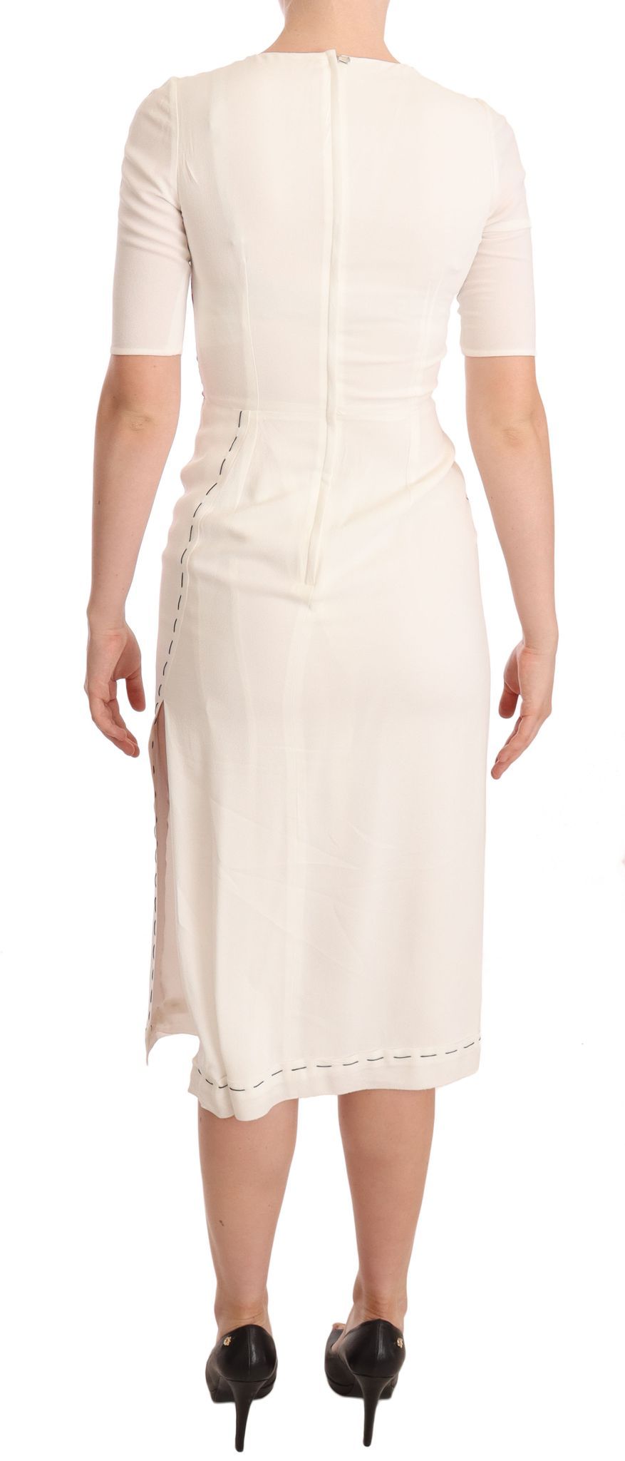 A white floral print midi dress with a slit on the side