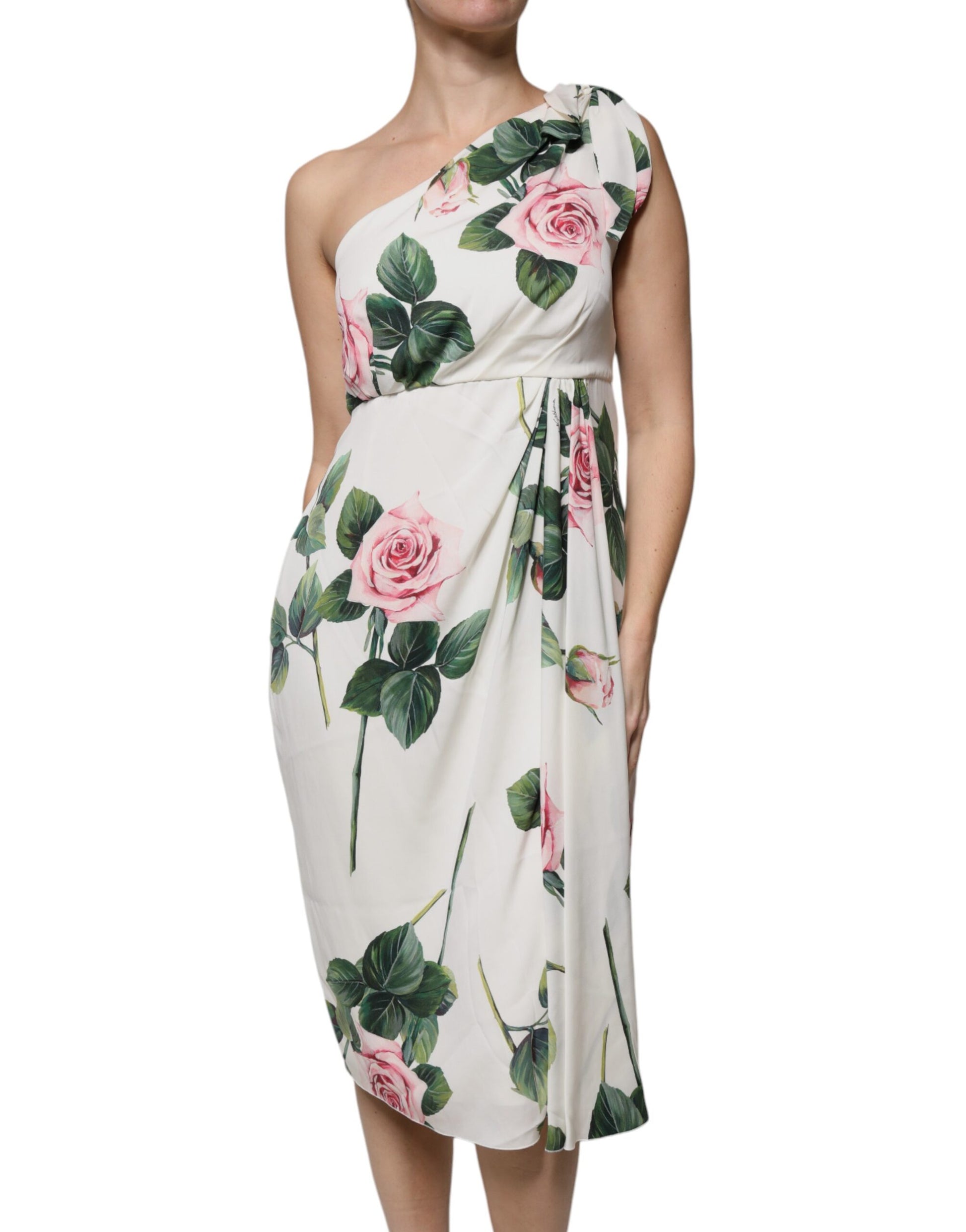 A white floral silk midi dress with a one shoulder design, featuring pink roses on the bodice