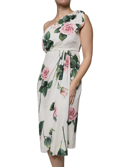 A white floral silk midi dress with a one shoulder design, worn by a model