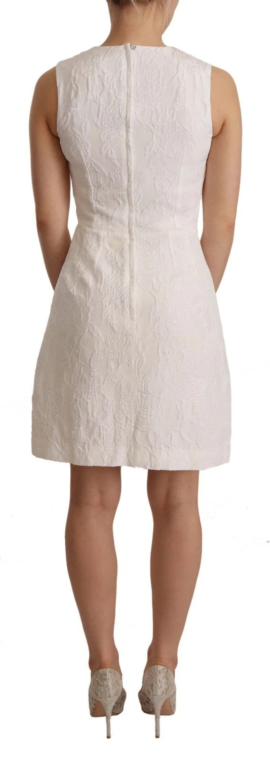 A white floral sleeveless sheath mini dress
