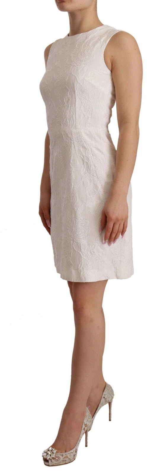 A white sleeveless sheath dress with floral pattern, designed by Dolce & Gabbana
