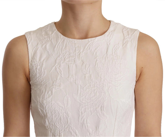 A sleeveless white dress with a floral pattern, featuring a fitted silhouette and a V-neckline