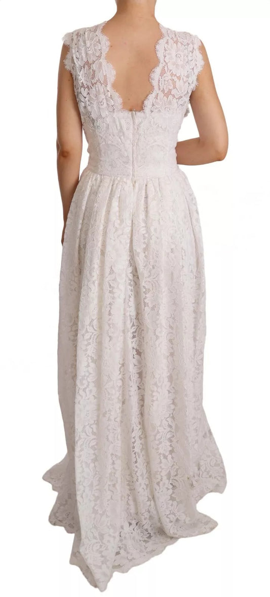 A white lace dress with a long skirt and floral pattern