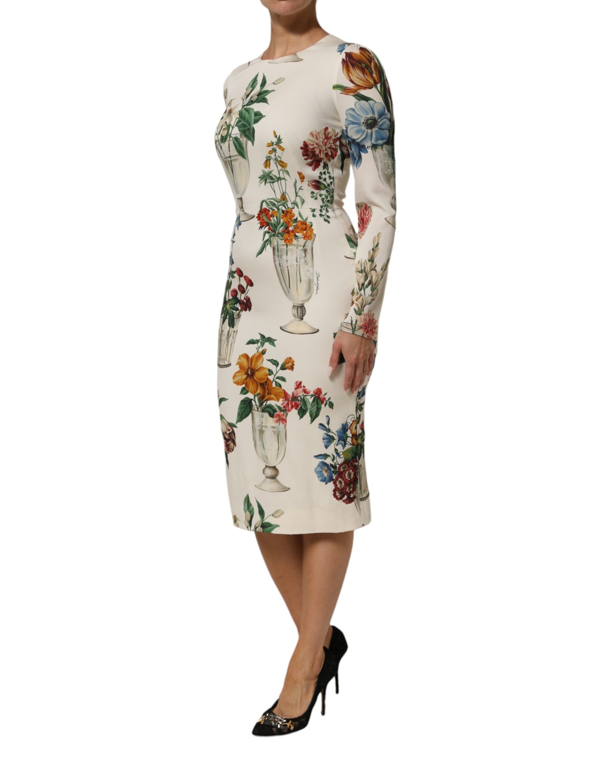 A midi dress with a floral pattern and vase design on the front, from the brand Dolce & Gabbana