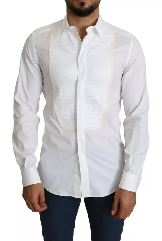 A white formal tuxedo dress shirt with gold accents, worn by a mannequin