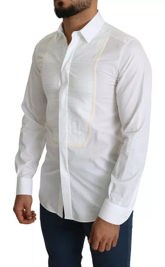 A mannequin wearing a white tuxedo dress with gold shirt