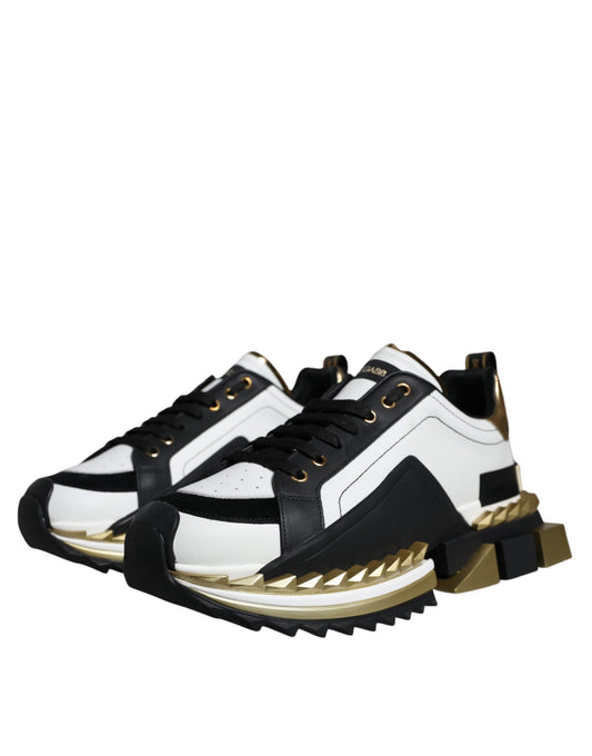 Black and white sneaker with gold accents