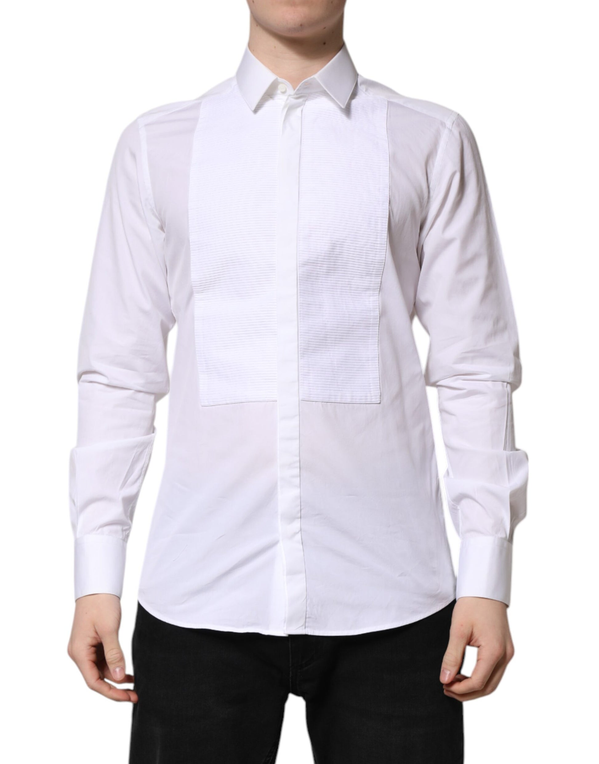 A white cotton shirt with gold accents, featuring a bib front and long sleeves