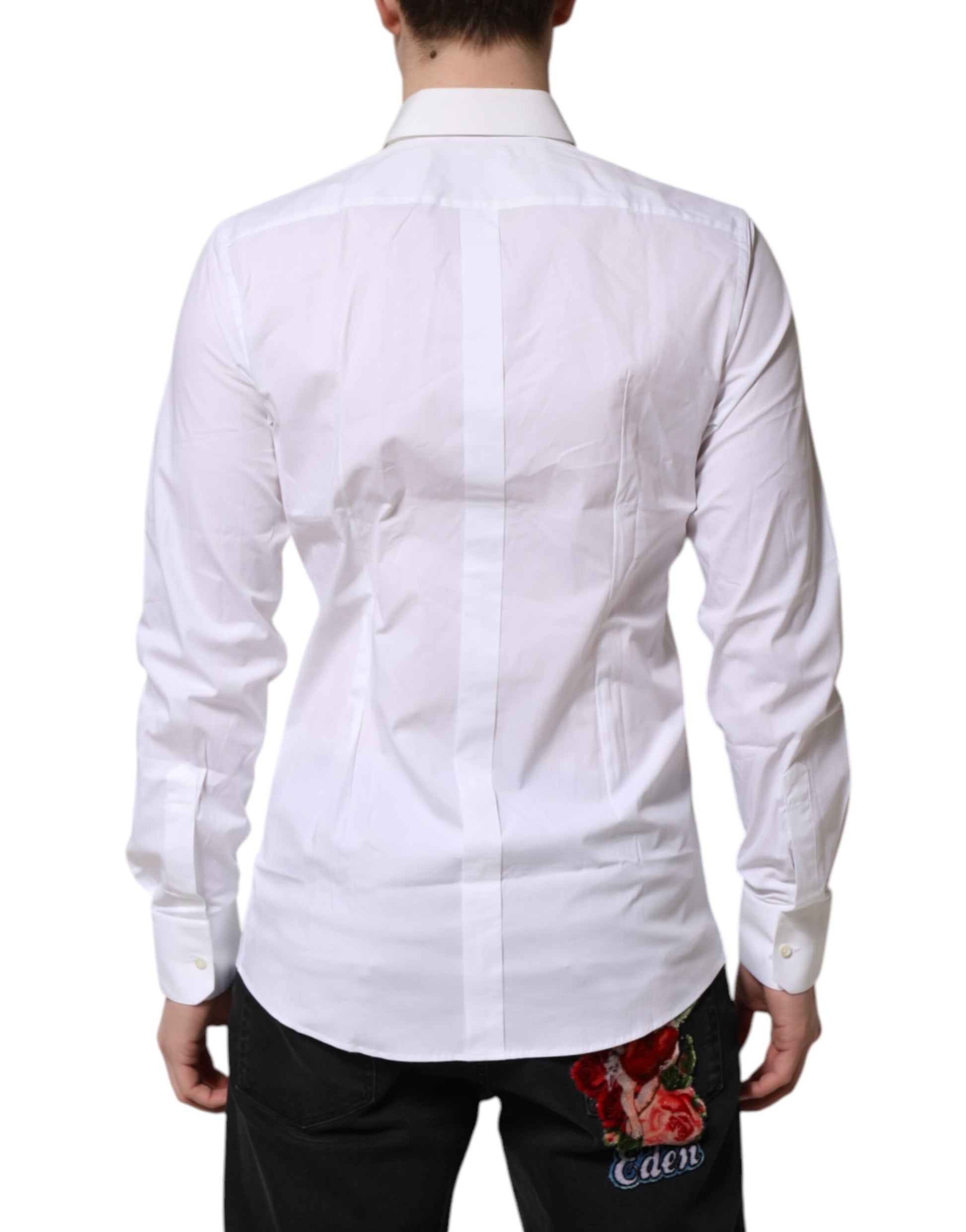 A white collared dress shirt with gold accents, featuring a back view
