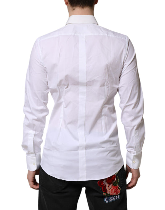 A white collared dress shirt with gold accents, featuring a back view