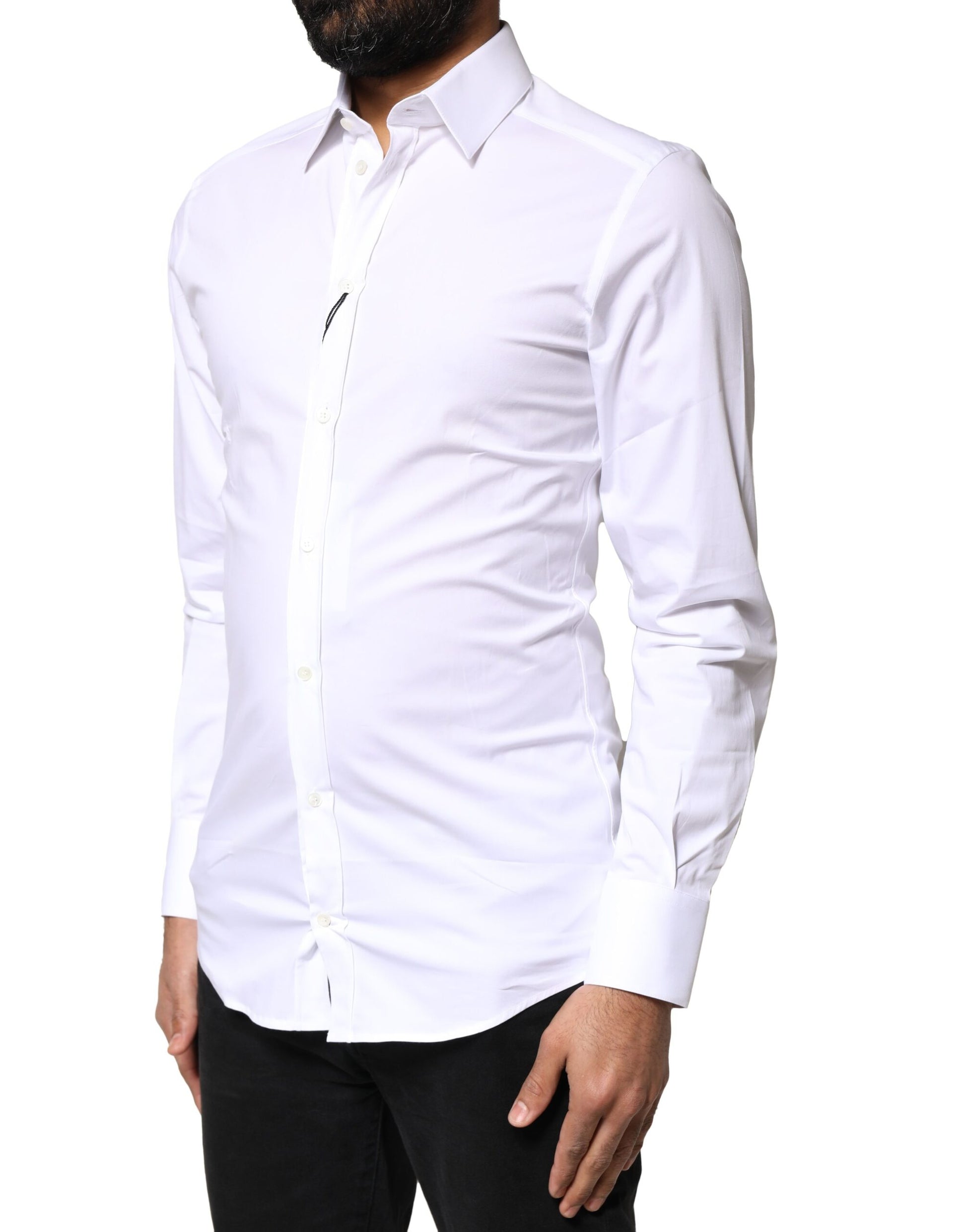 A white long sleeve dress shirt with gold accents, designed by Dolce & Gabbana